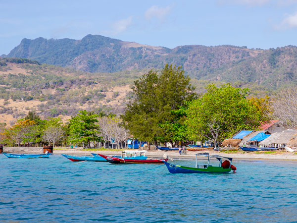 boats moored along a coastal community in Timor-Lester