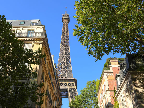 view of the Eiffel Tower from a street in Paris