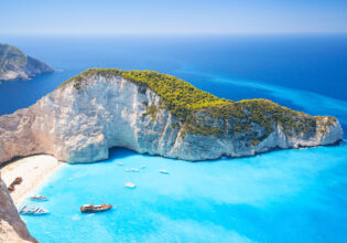 an aerial view of Navagio bay and Ship Wreck beach, Greek Islands