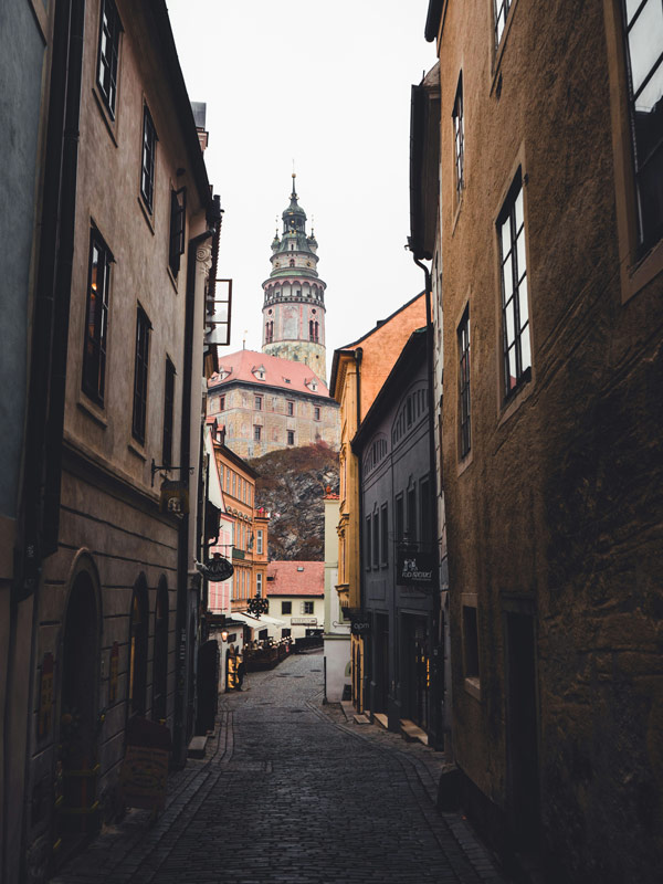 the view of Český Krumlov Castle from the cobbled streets