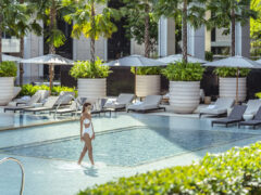 Woman in pool at Four Seasons Bangkok