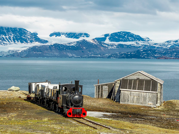 Train and the mountains in Svalbard.