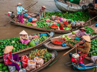 women selling fresh produce at Cai Rang Floating Market vietnam