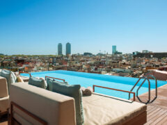 Balinese beds by the rooftop pool at Grand Hotel Central Barcelona