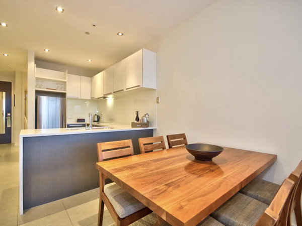 the dining and kitchen at the superior two bedroom apartment at The Rees Queenstown