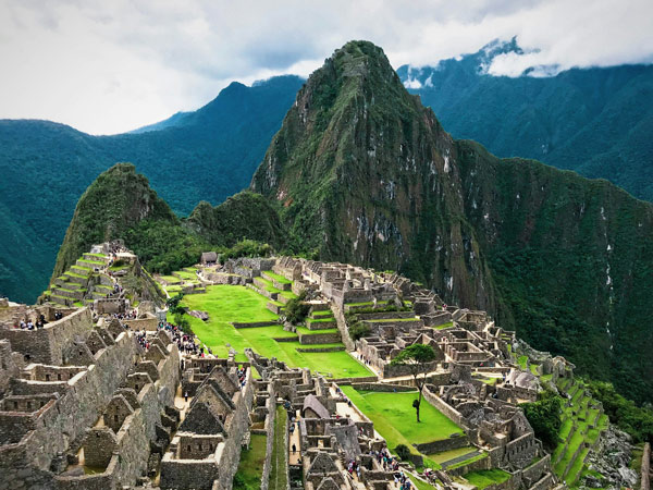 Machu Picchu, an ancient Incan citadel located in the Andes Mountains of Peru, above the Sacred Valley