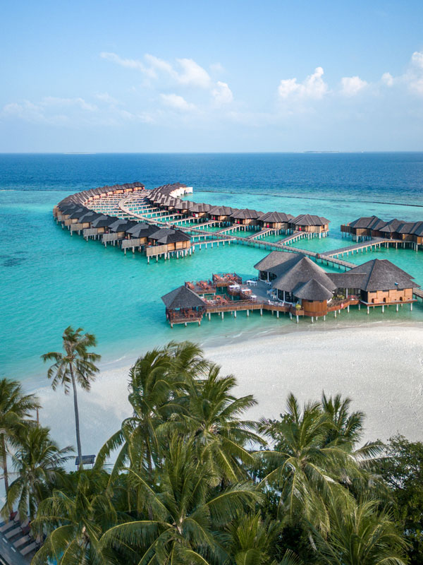 an aerial view of a beach resort in Maldives