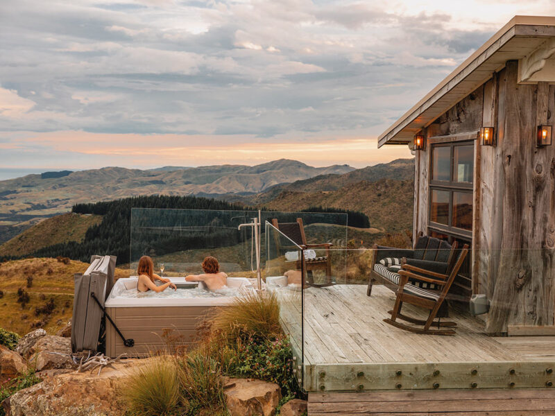 couple in outdoor spa at Matai Peak in New Zealand