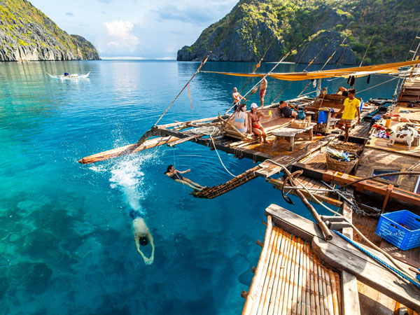 guests aboard a boat in Palawan, Philippines