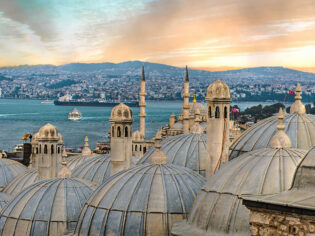 View from the Suleymaniye Mosque complex to the Golden Horn, Istanbul, Turkey. Sunset time