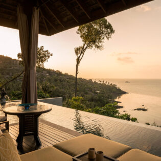 sunset on the deck of a villa at Four Seasons Resort Koh Samui