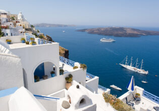 A stunning view of the waters and cruise ships in Santorini, Greece