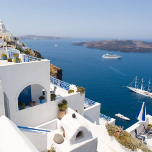 A stunning view of the waters and cruise ships in Santorini, Greece