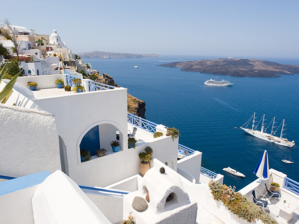 A stunning view of the waters and cruise ships in Santorini, Greece