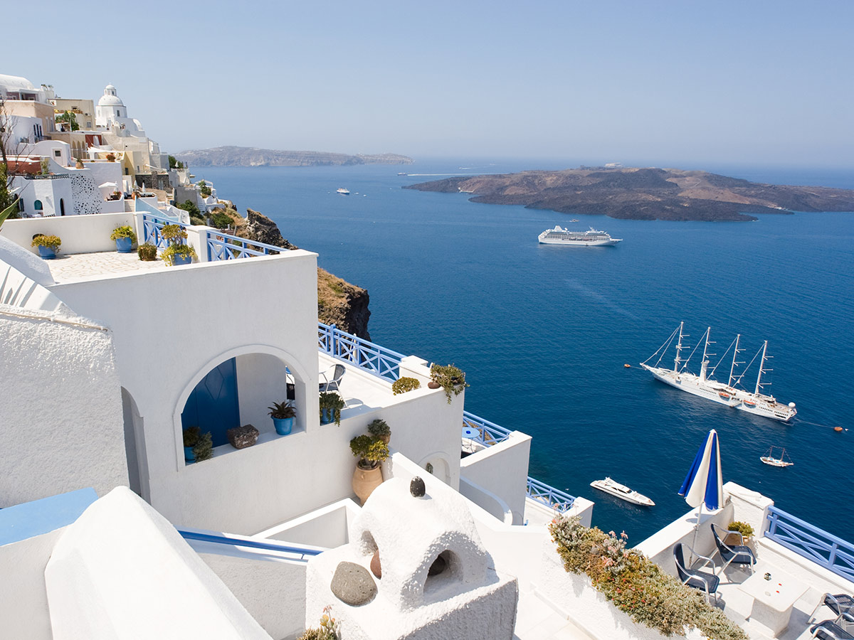 A stunning view of the waters and cruise ships in Santorini, Greece
