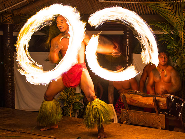 fire dancers at a fiafia night in samoa