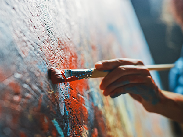 Female Artist Works on Abstract Oil Painting