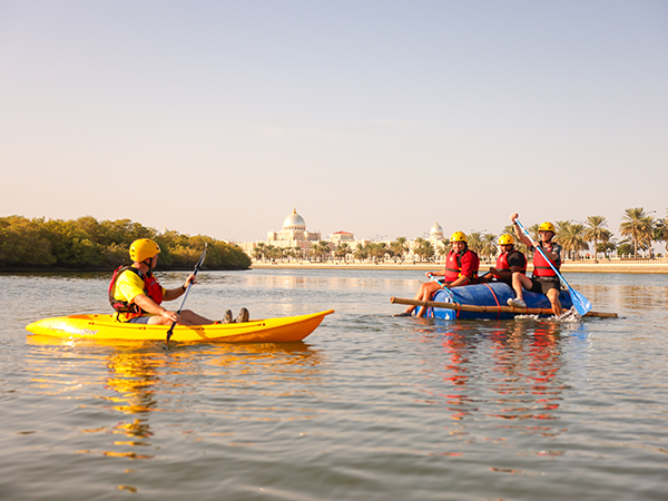 People Kayaking with Hero Experiences.