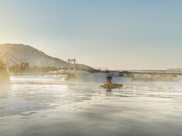 A render of a guest enjoying the views at Laugaras Lagoon