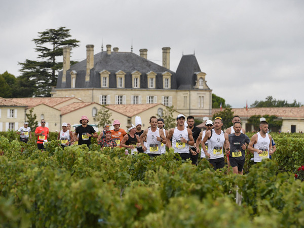 Runners in the Marathon du Médoc in Bordeaux, France