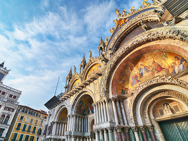 The Clock Tower and the Basilica of San Marco in Venice, Italy