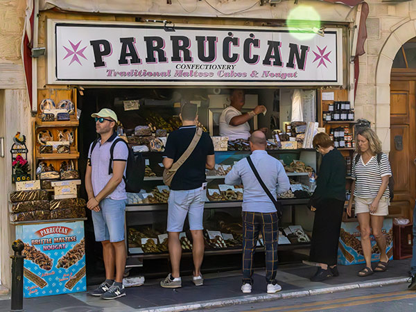 Rabat, Malta, Nov 4, 2024 People buying sweets from Parruccan Confectionery, a traditional bakery on Pjazza San Pawl