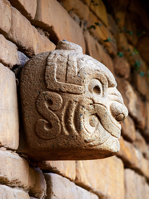 Ancient stone carving on a wall at Chavín de Huántar in the Peru Highlands.