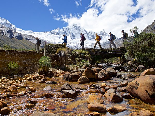 Hikers trekking the trails of Nevado Huascarán in the Peru Highlands.