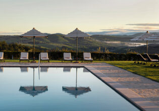 The Club House Outdoor Pool view of tuscany