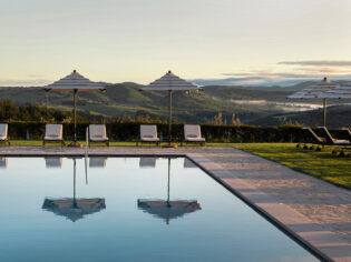 The Club House Outdoor Pool view of tuscany