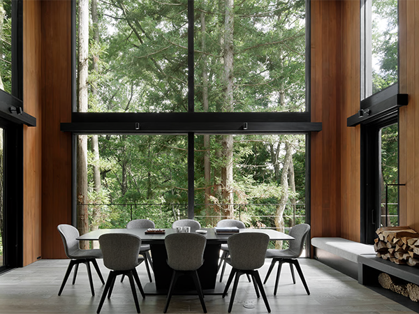 Villa El Cielo sits quietly in a snow-dusted forest, only 150 metres from the Sakka lifts, wrapped in cedar wood accents, sweeping glass panels, and the warmth of glowing fireplaces.