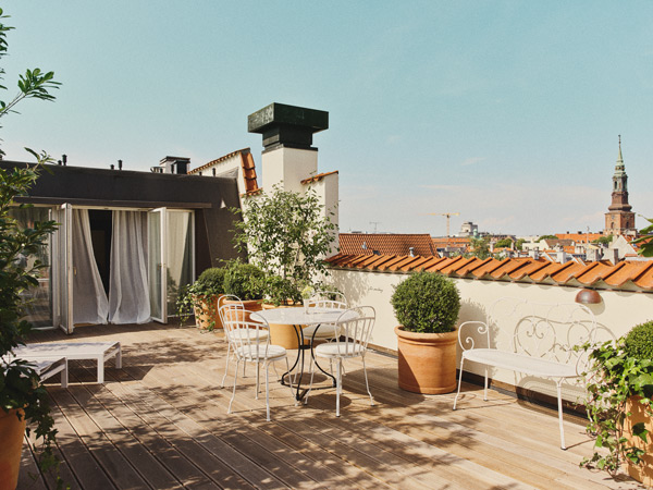 a private rooftop terrace at Hotel Bella Grande