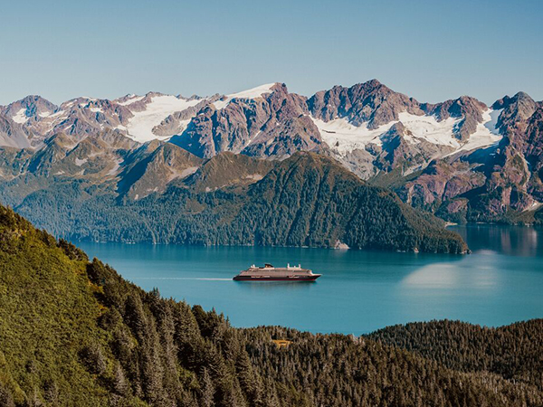 Explora Journeys ship cruising in Alaska.