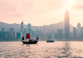 the Dukling boat cruising the Victoria Harbour Hong Kong