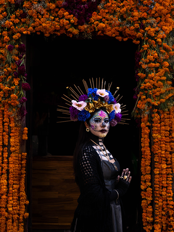 emblematic catrina of mexico with flowers and necklace with sempasuchil flowers