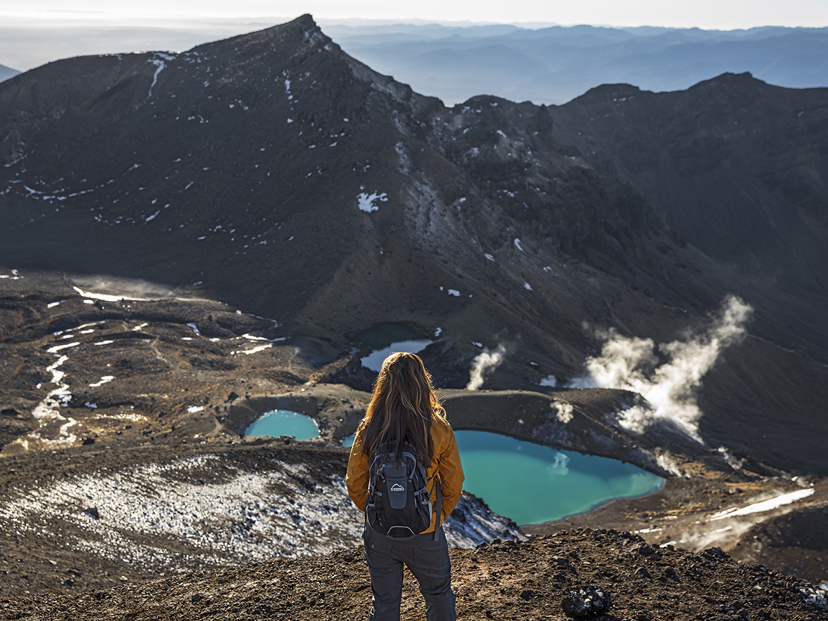 A woman gazing at the striking view of Mt Ngauruhoe.