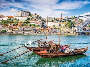Colourful rabelo boats along Porto’s waterfront.