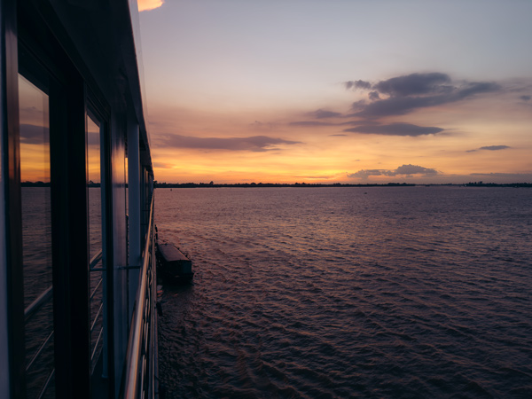cruising the Mekong River at sunset