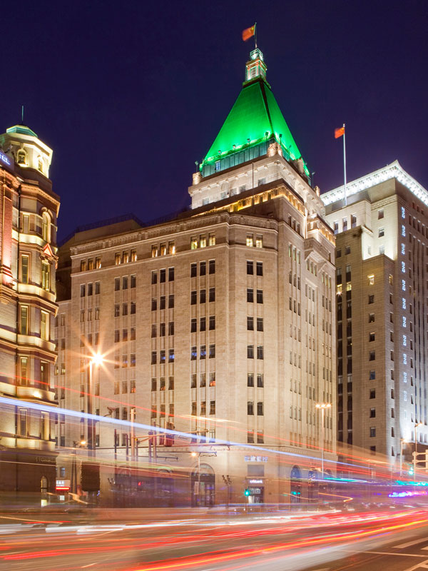 the Fairmont Peace Hotel at night