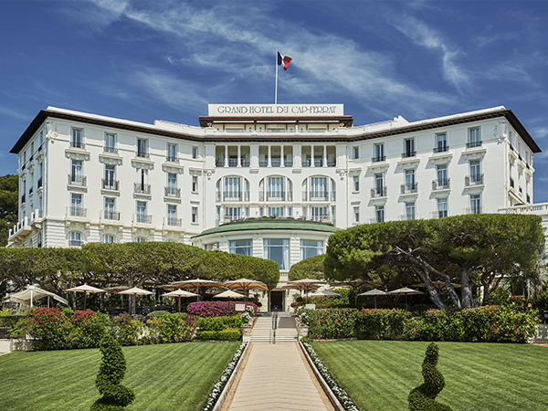 The grand white exterior of the Grand-Hotel du Cap-Ferrat, A Four Seasons Hotel