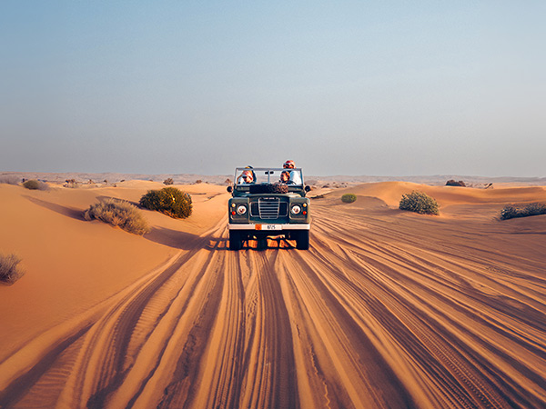 tour group in Vintage Land Rover on hero experiences Platinum Heritage