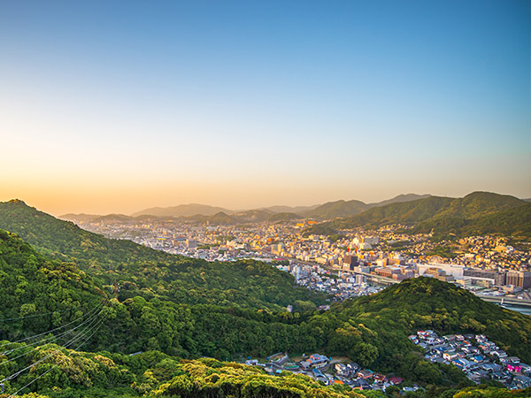 Nagasaki city view in the evening taken while being on cable car of Nagasaki ropeway to Mount Inasa Observation Platform