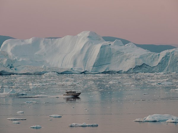 A boat sailing along The Northwest Passage