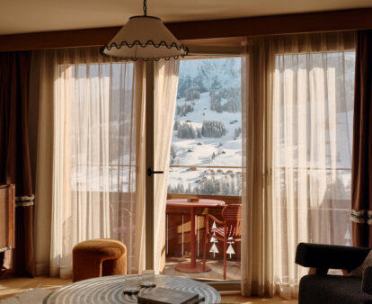 View of Swiss Alps covered in snow from inside The Brecon suite