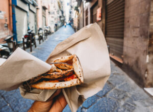 Point of view of a man eating a typical 