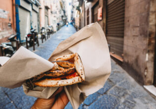 Point of view of a man eating a typical 