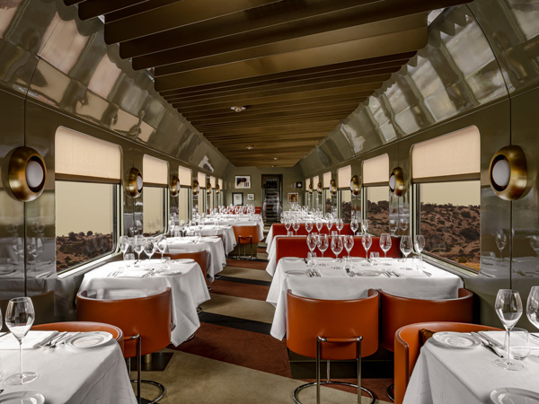an elegant dining setup onboard La Dolce Vita Orient Express Whispers at Midnight