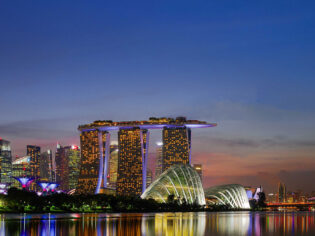 Exterior of Marina Bay Sands and Singapore's skyline.