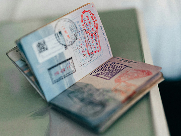 open passport with stamps in it