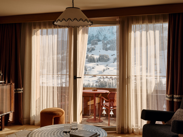 View of Swiss Alps covered in snow from inside The Brecon suite